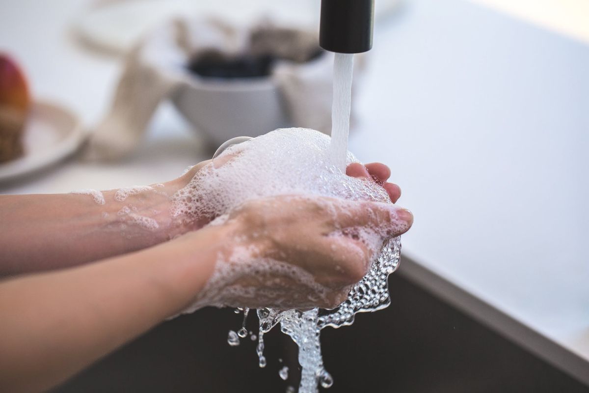 Hands washed clean under running water